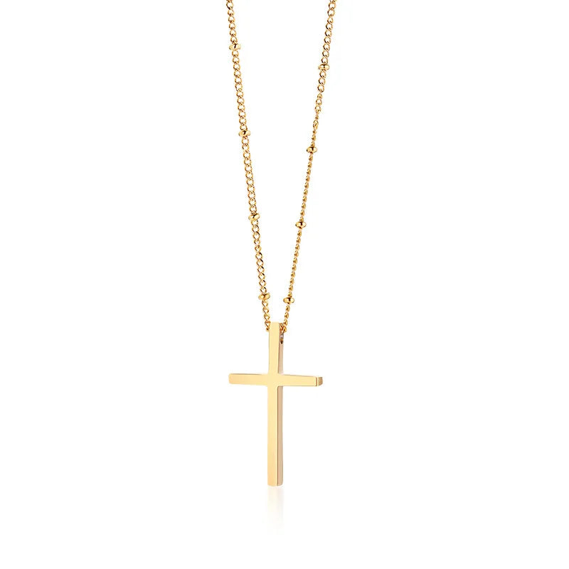magnifique chaîne pour femme avec pendentif discret en forme de croix.