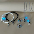 Coffret Couple Astronaute – Bracelets, Colliers & Bagues lumineux